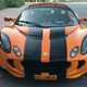 Illustration for article titled For $29,999, Could This Orange And Black 2005 Lotus Elise Have You Ready For Halloween?em/em
